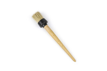 Round paint brush isolated on white background with copy space.