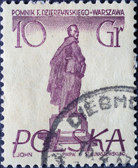 POLAND-CIRCA 1955 : A post stamp printed in Poland showing a Warsaw figure: feliks e. dzerzhinski, warsaw monument, polish revolutionary - obrazy, fototapety, plakaty