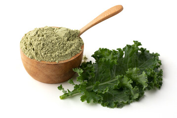 Wooden spoon scoop kale powder on wooden bowl, fresh kale isolated on a white background, super...