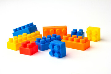 Many color square puzzle toys isolated on a white background.
