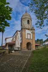 Fototapeta na wymiar Parish Church of Santa María de Sabada is located in LLastres (Lastres), in the Asturian council of Colunga.