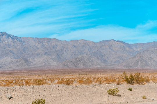 Beautiful panoramic landscape with mountains and desert in Death Valley, USA.