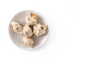 Traditional American biscuits and gravy for breakfast isolated on white background. Top view. Copy space