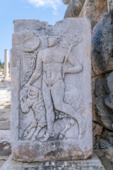 Celsus Library in Ephesus in Selcuk (Izmir), Turkey. Marble statue is Sophia, Goddess of Wisdom, at the Celcus Library at Ephesus, Turkey. The ruins of the ancient antique city.