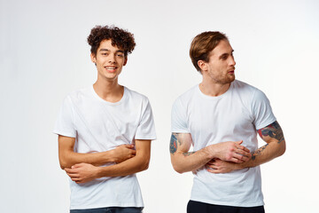 emotional two friends in white t-shirts yes fun studio