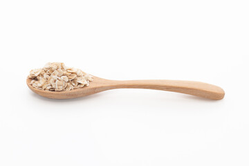 1 spoon of oatmeal isolated on a white background, side view.