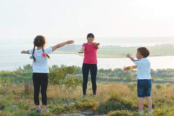 mother and two children making exercises