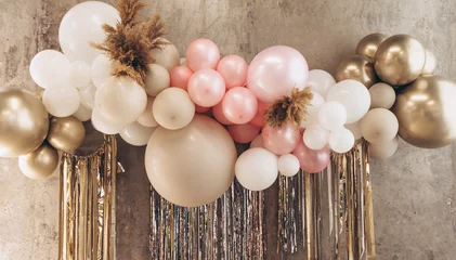 Poster balloons with helium in pastel colors pink, white and beige as a decoration for a birthday or anniversary and a background for photos and greetings © klavdiyav