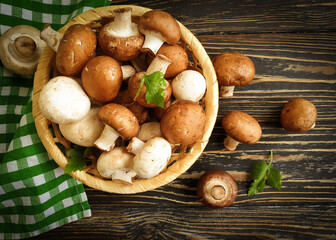 fresh mushrooms on a wooden background