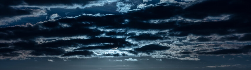 Naklejka na ściany i meble Panoramic Full Moon Behind Clouds at night Panorama Web Banner Header