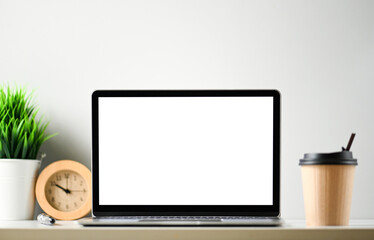 Fototapeta premium Laptop computer with blank screen in office