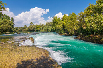 Naklejka na ściany i meble Manavgat Waterfall in Turkey. It is very popular tourist attraction.