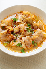 pork wonton soup or pork dumplings soup with roasted chili
