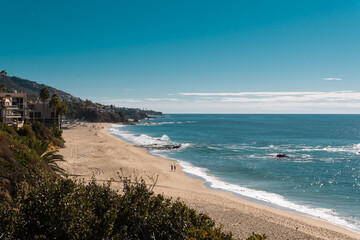 sunny beach with people coast los angeles