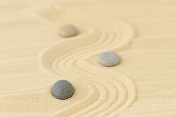 Summer background for relaxation with small stones on the sand