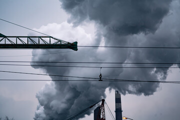 Dirty, dark industrial smoke background close up. Factory pipe polluting air.