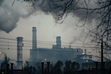 Dirty, dark industrial smoke background close up. Factory pipe polluting air.