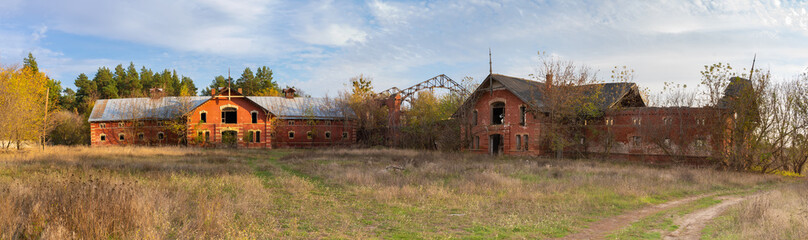 Panorama view of the buildings of the old abandoned stables in the Natalyevka estate, Kharkiv region, Ukraine