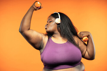 Young woman making pilates and functional training at the gym