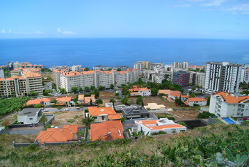 funchal residential area facing atlantic ocean, houses buildings and apartments in touristic place