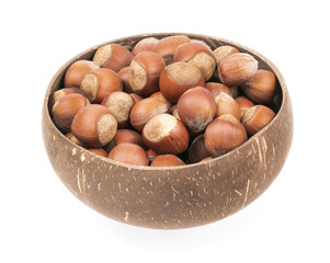 Unpeeled hazelnuts in a cup isolated on white background. hazelnuts in shell
