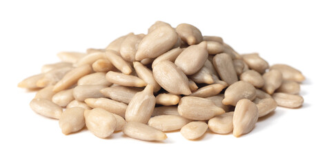 pile of peeled sunflower seeds isolated on white background