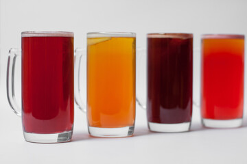 craft and colored beer set in mugs isolated