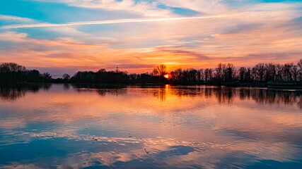 Beautiful sunset with reflections near Plattling, Isar, Bavaria, Germany