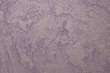 Pink background. Texture on the wall. Plaster.