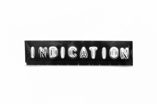 Embossed letter with word indication in black banner on white paper background