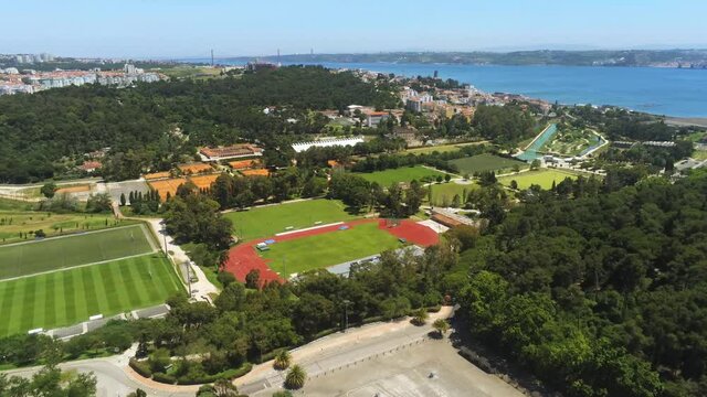 Aerial drone view overlooking the Complexo Desportivo do Jamor, in Oeiras, Portugal