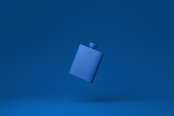 Blue hipflask floating in blue background. minimal concept idea creative. monochrome. 3D render.