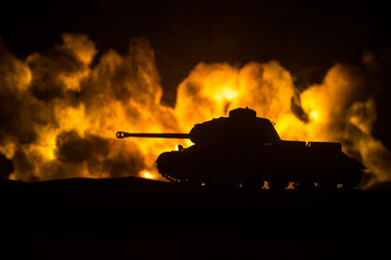 War Concept. Military silhouettes fighting scene on war fog sky background, World War Soldiers Silhouette Below Cloudy Skyline At night. Battle in ruined city.