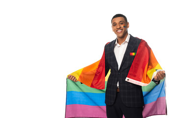 happy african american businessman holding lgbt flag while smiling at camera isolated on white