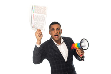 worried african american businessman holding newspaper and lgbt colors megaphone isolated on white