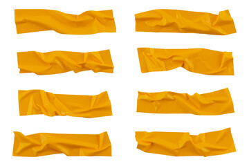 Fototapeta premium Yellow wrinkled adhesive tape isolated on white background. Yellow Sticky scotch tape of different sizes.