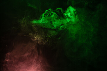 Green and pink steam on a black background.