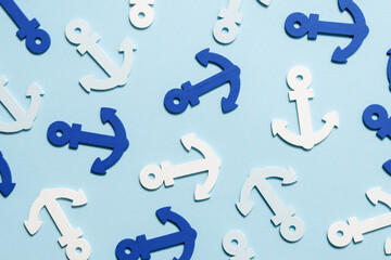 Blue anchors on a blue background.