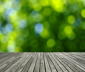 wooden table green blurred background