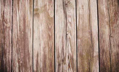 Naklejka premium Wooden texture background. Teak wood. Beautiful backgrounds of boards in which there are nails, old lumber, a fence of their strong wood