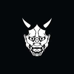 White on a black background Oni japanese demon mask.