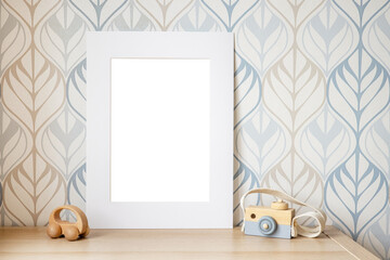White frame mock up for photo, print art, text or lettering, with kids room decorations and toys....