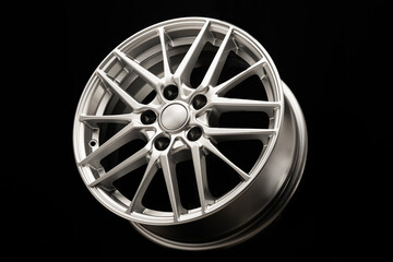 beautiful sports alloy wheels forged, on a dark black background