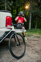 Cyclist and dog on bike adventure