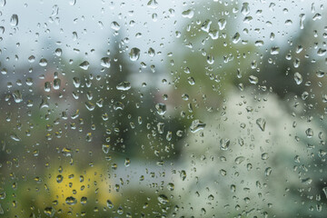 Raindrops on the window and wet surface