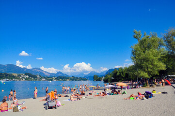 Fototapeta na wymiar Crowd of people enjoying holiday in Ufschötti, Lucerne, Switzerland.