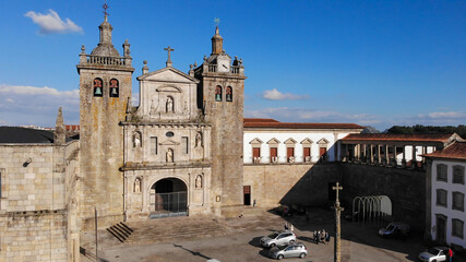 Obraz premium Viseu, Portugal - May 8, 2021: DRONE AERIAL VIEW - The Viseu Cathedral (Se Catedral de Viseu) is the Catholic bishopric seat of the city of Viseu, in Portugal.