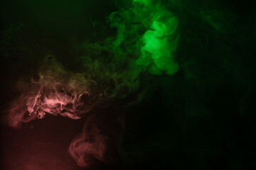 Green and pink steam on a black background.