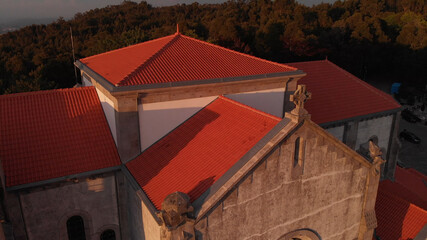 The red roofs of the church of Nossa Senhora da Assuncao (Our Lady of Assumption) in the hill of...