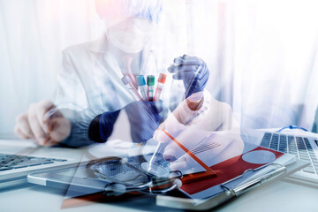 Doctor using digital tablet find information patient medical history at the hospital. Medical technology concept.